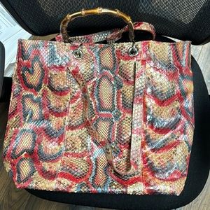 VERO PITONE SNAKESKIN HANDBAG USED BUT IK GOOD CONDITION.